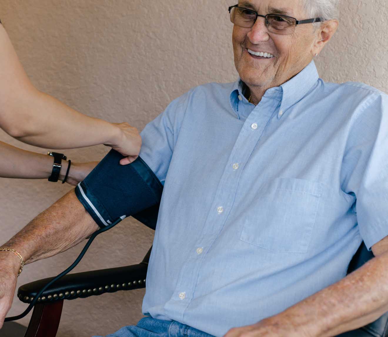 Photo of the patient getting their blood pressure taken